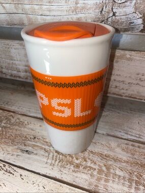 Starbucks "Team PSL" ceramic travel mug featuring a 10 oz "Pumpkin Spice Latte"